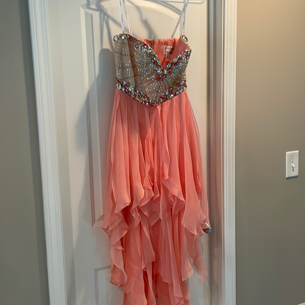 Peach colored dress with beautiful beads size 4